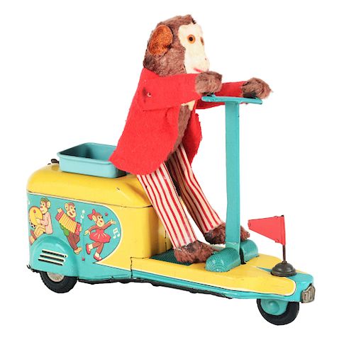 Tin Litho Battery Operated Early Monkey Scooter.