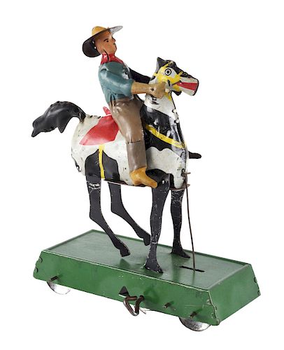 Tin Litho and Hand Painted Wind Up Wild West Bucking Bronco.