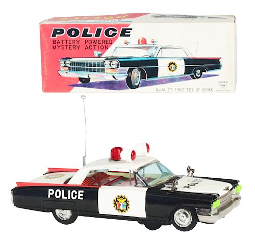 Tin Litho Battery Operated Cadillac Police Car.