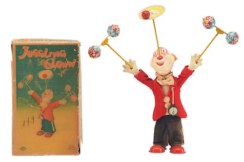 Tin Litho and Composition Wind Up Juggling Clown.