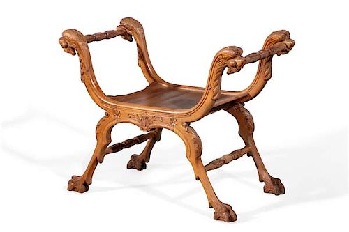 A Continental Baroque style walnut curule stool