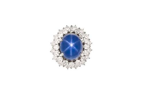A 22 carat star sapphire, diamond & platinum ring
