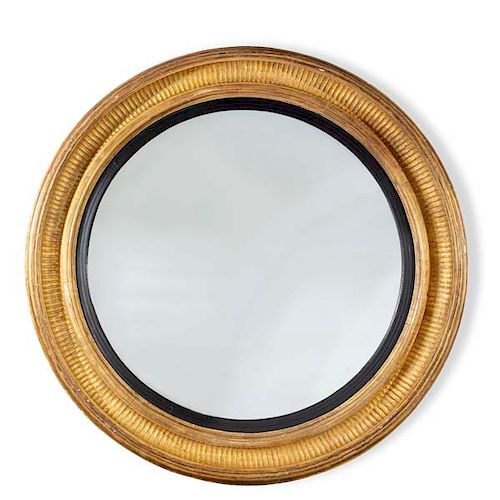 A monumental Regency  circular giltwood mirror