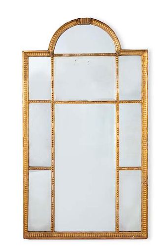 A Continental Neoclassical style giltwood mirror