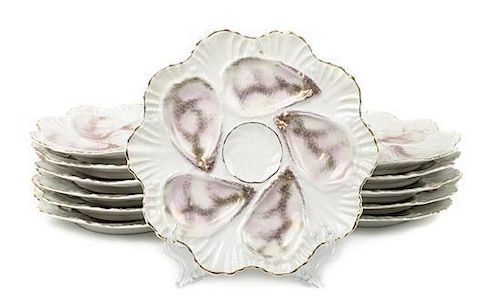 Twelve German Porcelain Five Well Oyster Plates, Diameter 8 3/8 inches.