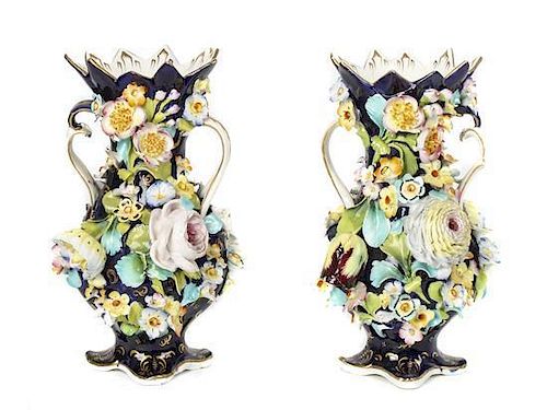 A Pair of Continental Floral Encrusted Twin Handle Porcelain Vases, Height 9 1/2 inches.