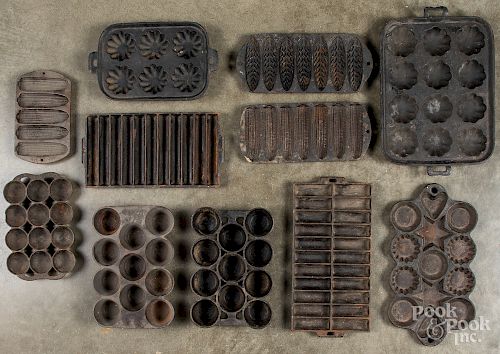 Collection of cast iron food molds.