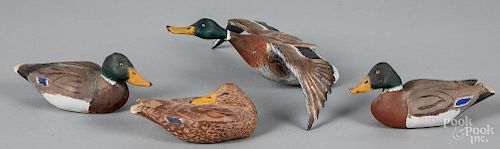 Three miniature carved and painted ducks, etc.