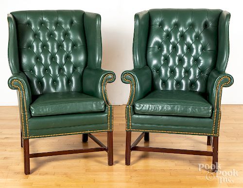 Pair of Chippendale style wing chairs.