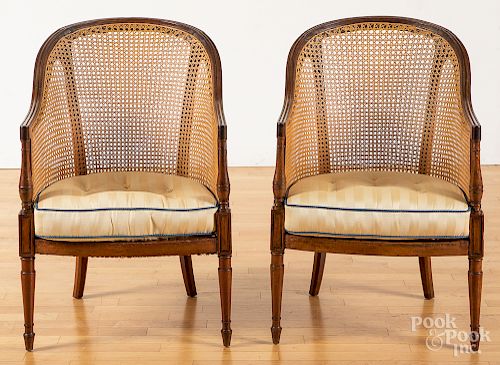 Pair of English mahogany caned armchairs