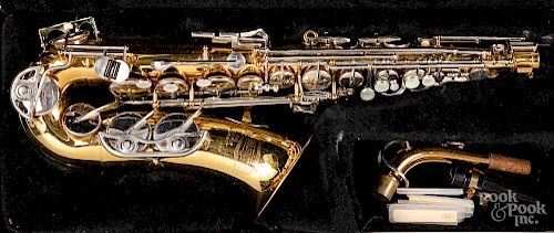 Cased Selmer Bundy II saxophone.