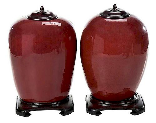 Near Pair Chinese Sang de Boeuf Jars on Stands