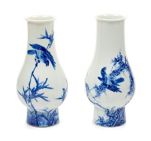 Two Blue and White Porcelain Vases Height 7 inches.
