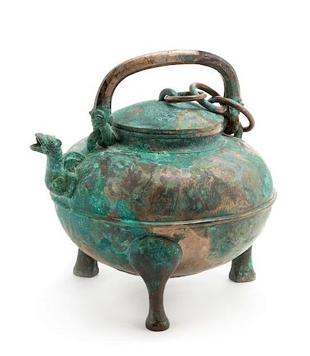 An Archaic Bronze Covered Wine Vessel, He Diameter 8 inches.