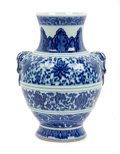 * A Blue and White Porcelain Zun Vase Height 10 1/4 inches.