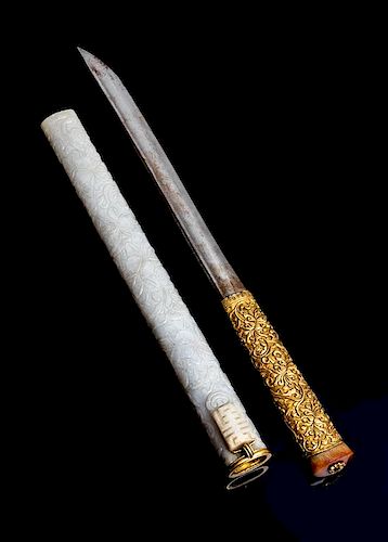 A Gilt Bronze Handled Dagger with White Jade Scabbard Length overall 12 1/4 inches.