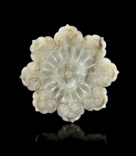 A Grey Jade Mughal Style 'Flower' Plaque Diameter 2 5/8 inches.