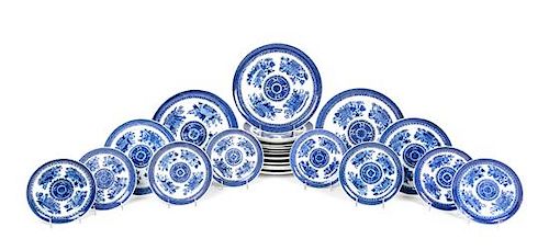 * A Set of Twenty-Four Chinese Export Blue and White 'Fitzhugh' Porcelain Plates Diameter of largest 10 inches.