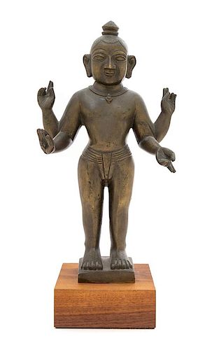 An Indian Bronze Figure of a Deity Height 13 3/4 inches.