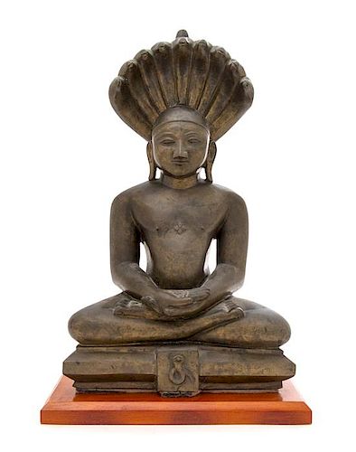 An Indian Bronze Figure of Mucalinda Height 14 inches.
