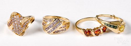 Four 14K yellow gold gemstone rings