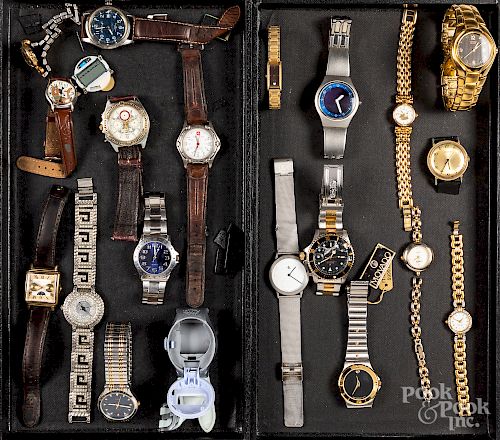 Assorted group of men and women's wristwatches.