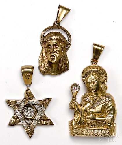 Three 10K yellow gold pendants