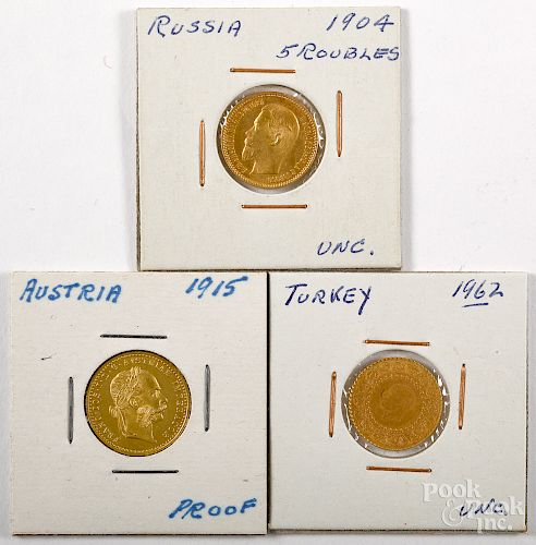 Three gold coins