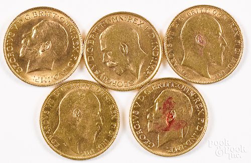 Five George V gold sovereigns.