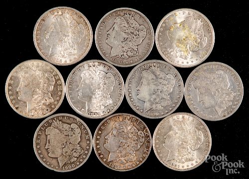Ten Morgan silver dollars.