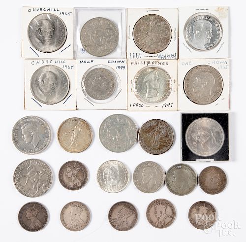 Foreign coins, mostly silver.