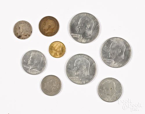 Coins, to include three Eisenhower silver dollars.