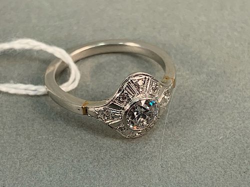 Platinum and diamond ring, center diamond approximately .55 cts. size 6