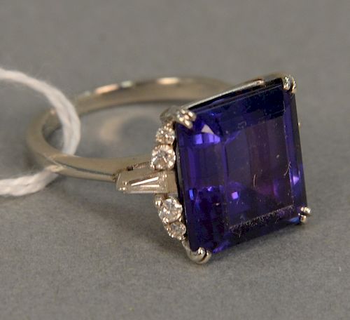 14 karat white gold ring, set with an emerald cut and garnet possibly Tanzanite, flanked by small diamonds, 11.9 x 12.8 mm, size 6 1/4.