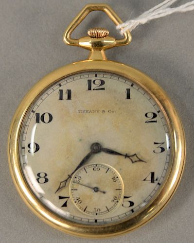 Tiffany & Co. 18 karat open face pocket watch, works marked International Watch Co. 17 Jewels, dial marked Tiffany, 44 mm.