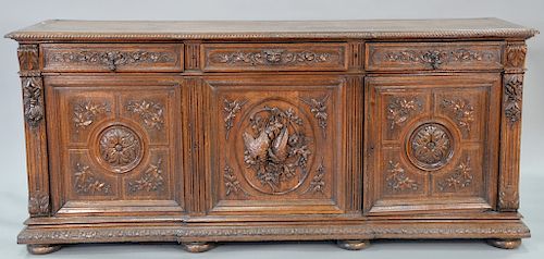 Continental oak huntboard with drawers and doors. ht. 40 in., top: 23" x 89 1/2" Provenance: From an estate in Lloyd Harbor, Long Is...