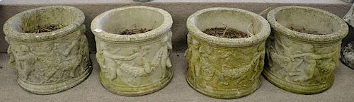 Set of four round cement urns, ht. 12 in., dia. 15 in. Provenance: From an estate in Lloyd Harbor, Long Island, New York