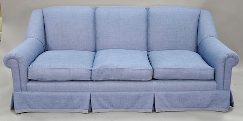Custom upholstered sofa with blue woven upholstery (like new condition). ht. 37 in., lg. 90 in.
