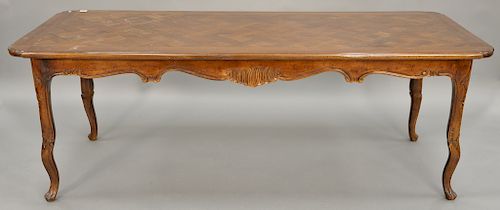 Louis XV style dining table with parquetry inlaid top. ht. 30 1/2 in., top: 35" x 85 1/2" Provenance: From an estate in Lloyd Harbor...