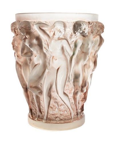 * A Rene Lalique Molded and Frosted Glass Bacchantes Vase Height 9 5/8 inches.