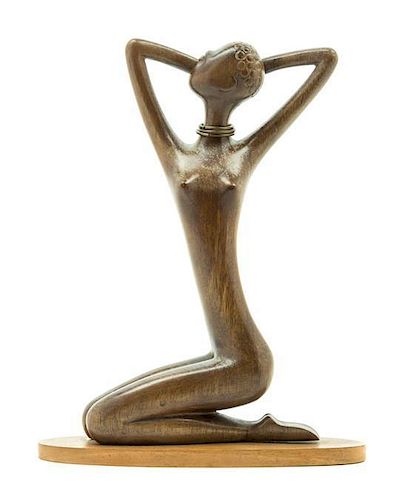 An Austrian Wood and Metal Sculpture Height 9 3/4 inches.