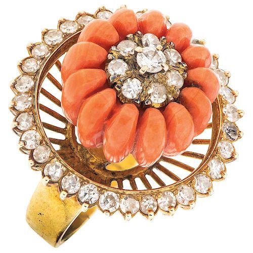 A coral and diamond 14K yellow gold ring.