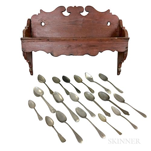 Carved Pine Hanging Spoon Rack and Sixteen Pewter Spoons.  Estimate $200-250
