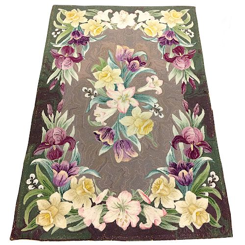 Three Floral-decorated Hooked Rugs.  Estimate $75-100