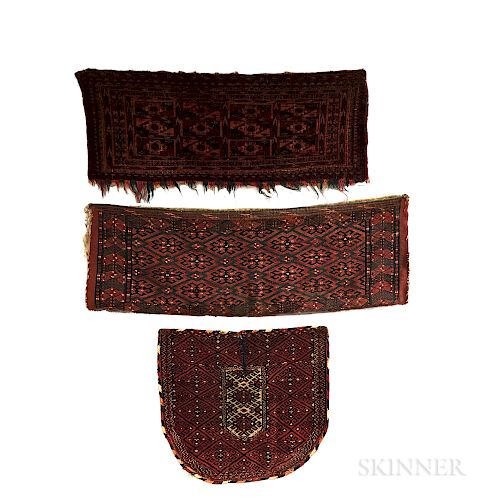 Three Turkoman Rugs, Two Torbas, and a Saddle Cover.  Estimate $300-400