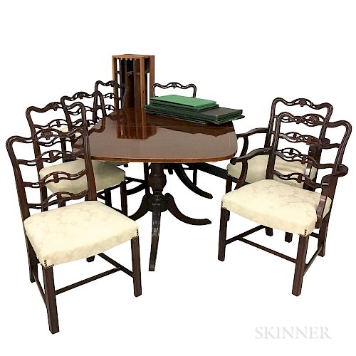Federal-style Inlaid Mahogany Veneer Double-pedestal Dining Table and Seven Ribbon-back Chairs.  Estimate $600-800