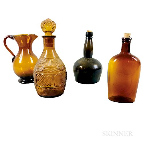Four Amber Glass Vessels