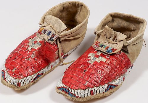 A PAIR OF PLAINS QUILLED AND BEADED MOCCASINS
