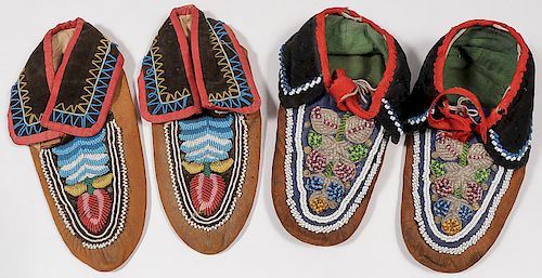 A PAIR OF IROQUOIS BEADED HIDE MOCCASINS
