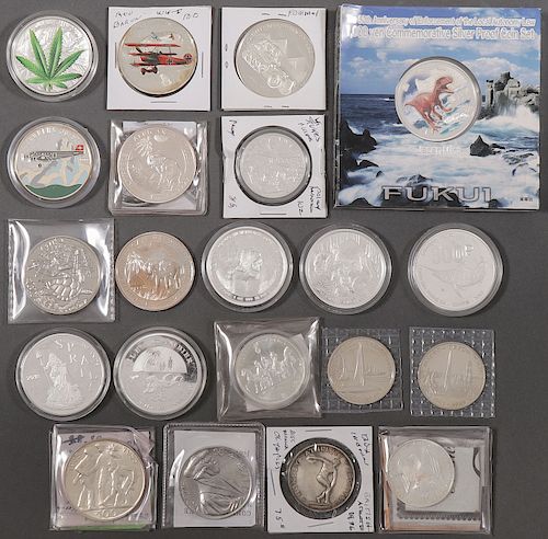 21 FOREIGN SILVER COMMEMORATIVES